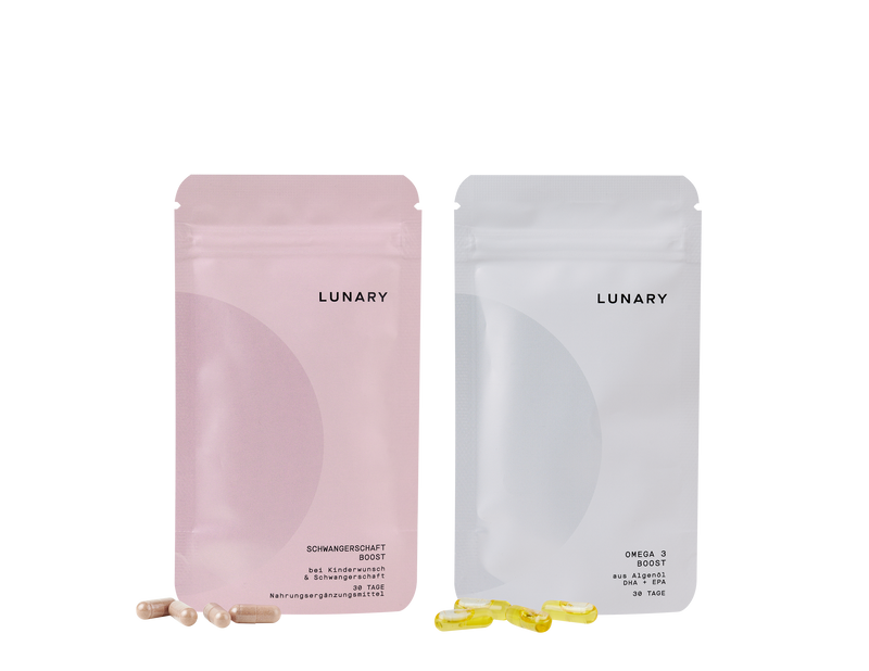 Schwangerschaft Boost Nahrungsergänzungsmittel von Lunary in pink und Omega-3 Kapseln in weiß, für gesunde Schwangerschaft.